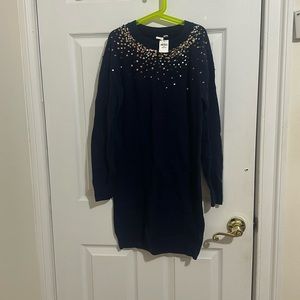 Gap kids (XXL) dress. To give an example, I am 5’4 and this fits up to my knees.